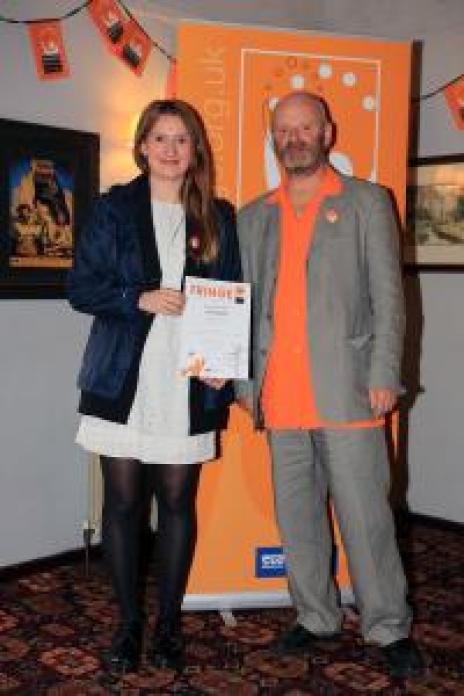 Director Lucy Allan collecting the award for 'Best Spoken Word Show' at Buxton Fringe Festival.